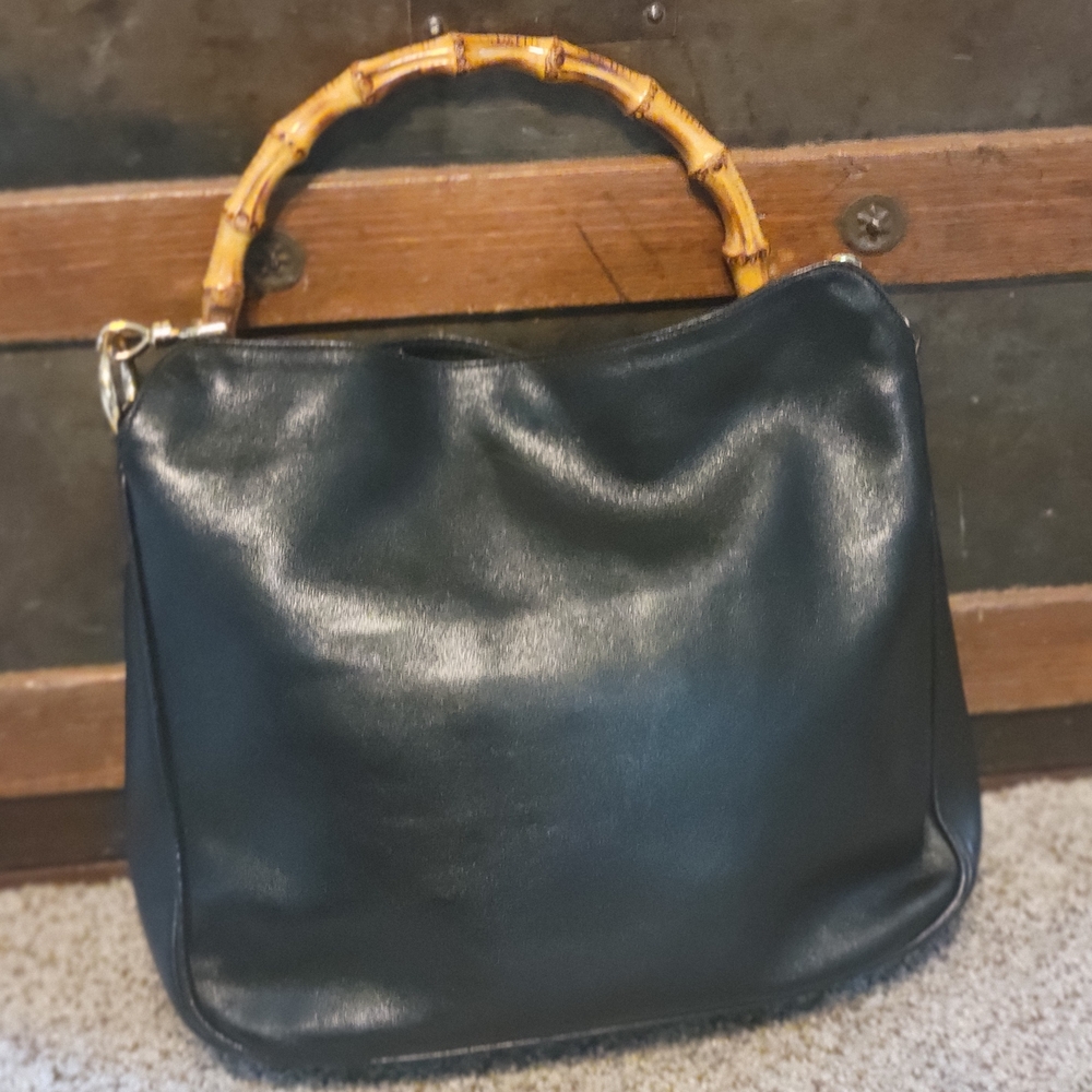 Elegant Black Leather Shoulder Bag with Bamboo Handle